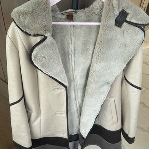 Jacket tan with some darker brown outside and gray inside